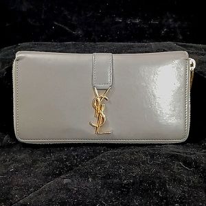 Yves Saint Laurent Cassandra Leather Zip Around Long Wallet. Preloved in gray